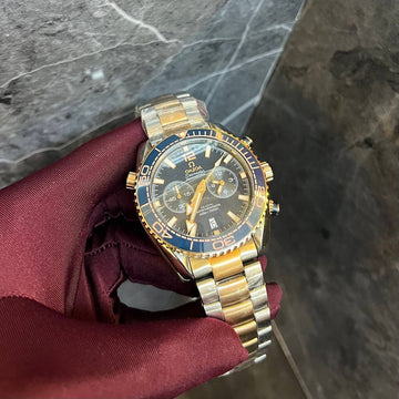 Omega speed master blue in rose gold steel strap