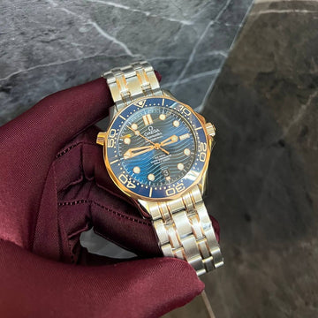 Omega semester blue in rose gold steel strap