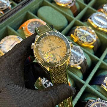 Omega semester green in white leather strap