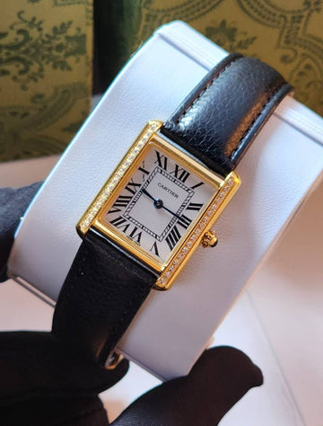 Cartier tank white black strap