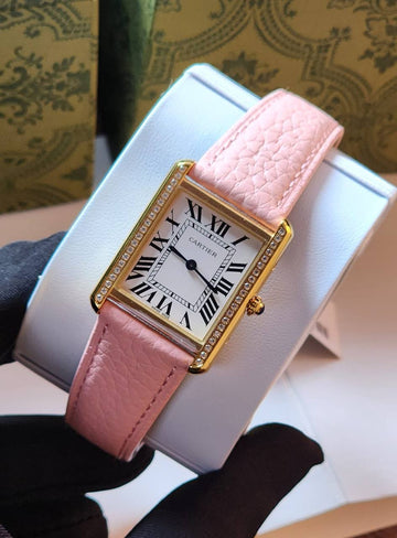 Cartier tank white in pink strap