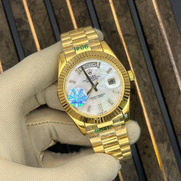 Rolex day date white in gold strap