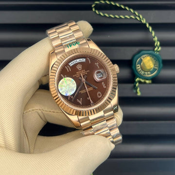 Rolex day date chocolate in rose gold strap Arabic dial