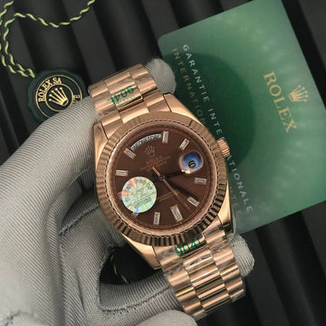 Rolex day date chocolate dial in rose gold