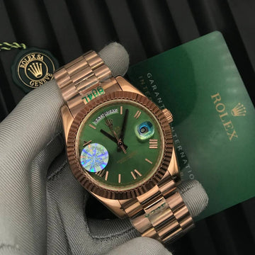 Rolex day date green in rose gold roman dial