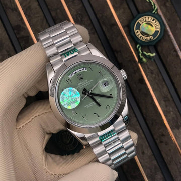 Rolex day date green in silver roman dial