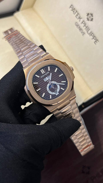Patek Philippe nautilus moon phase rose gold in chocolate