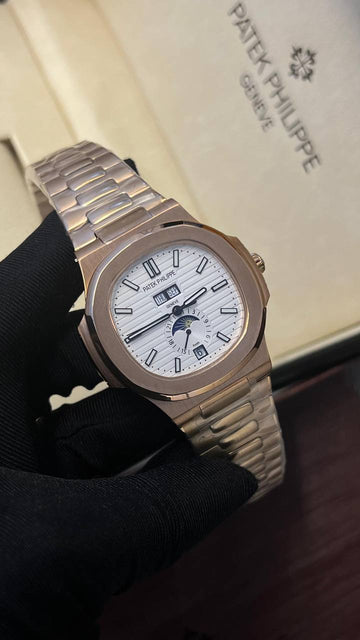 Patek Philippe nautilus moon phase rose gold in white